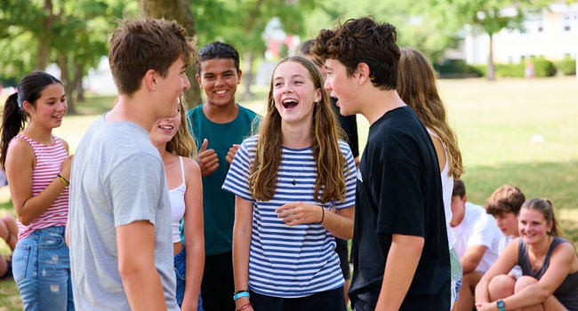 Group of students in Bournemouth England during a LISA! language study holiday in the park socialising together